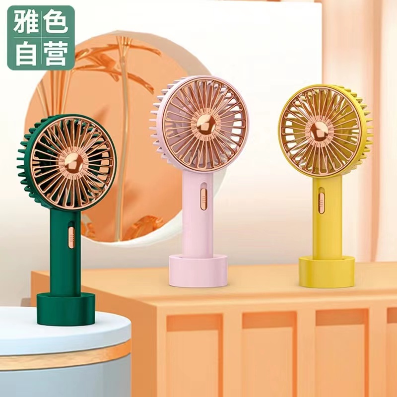 พัดลมพกพา USB ชาร์จ ตั้งโต๊ะ ขนาดเล็ก ปรับได้ 2 ระดับ มีไฟ LEDสีพาสเทลYM88101