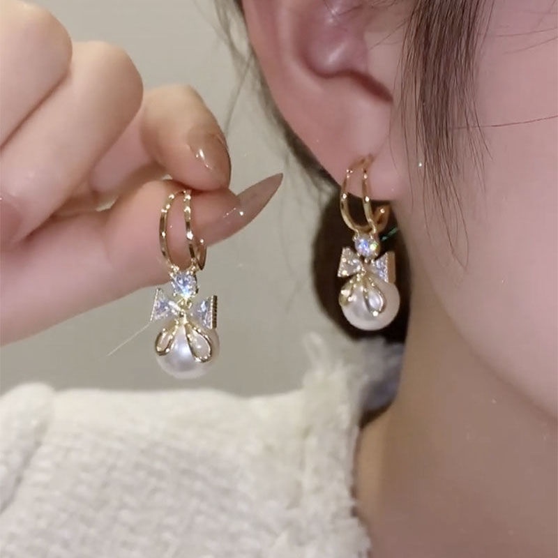 ต่างหูเงิน เกรด 925 ประดับโบว์ และไข่มุก