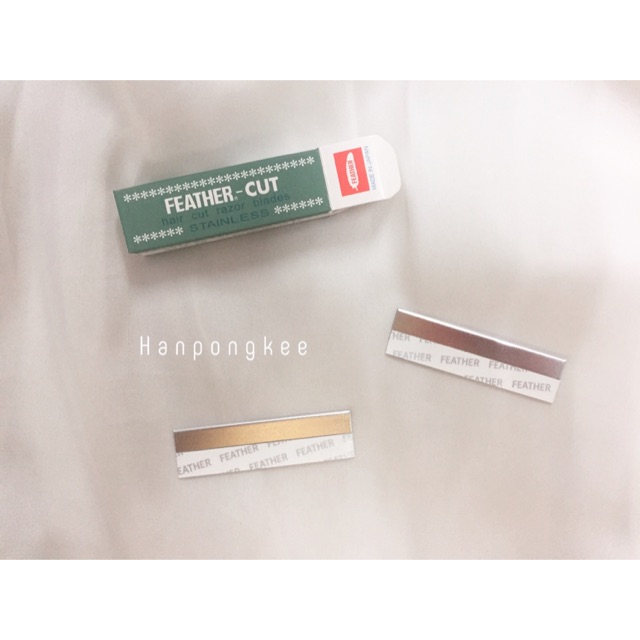 ใบมีดกันคิ้วขนนก feather