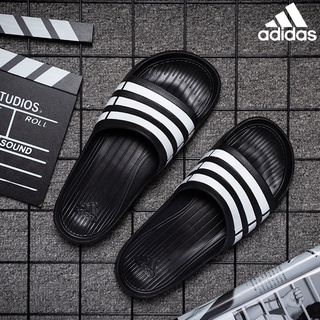 Adidas ของแท้ 100% DURAMO SLIDE รองเท้าแตะลําลอง กันลื่น เหมาะกับการว่ายน้ํา เล่นกีฬา สําหรับผู้ชาย ผู้หญิง G15890