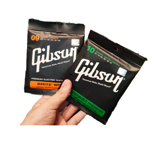 ครบชุด 6 เส้น  สายกีต้าร์โปร่ง สายกีต้าร์ไฟฟ้า และ สายกีต้าร์โปร่งไฟฟ้า Guitar Strings Gibson กิฟสัน กิ๊ฟสัน ฟรี ป๊ก