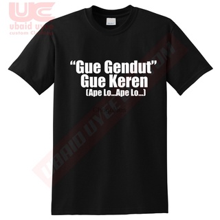 เสื้อยืดผ้าฝ้ายพิมพ์ลายขายดี เสื้อยืด ผ้าฝ้าย พิมพ์ลาย Gue Gendut Keren แฟชั่นสําหรับผู้ชาย