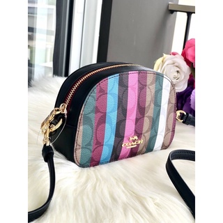 (ผ่อน0%) กระเป๋าสะพายข้าง Mini Serena Crossbody In Signature Canvas With Stripe Print ลายซี สีรุ้ง