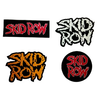 Skid Row ตัวรีดติดเสื้อ หมวก กระเป๋า แจ๊คเก็ตยีนส์ Hipster Embroidered Iron on Patch  DIY