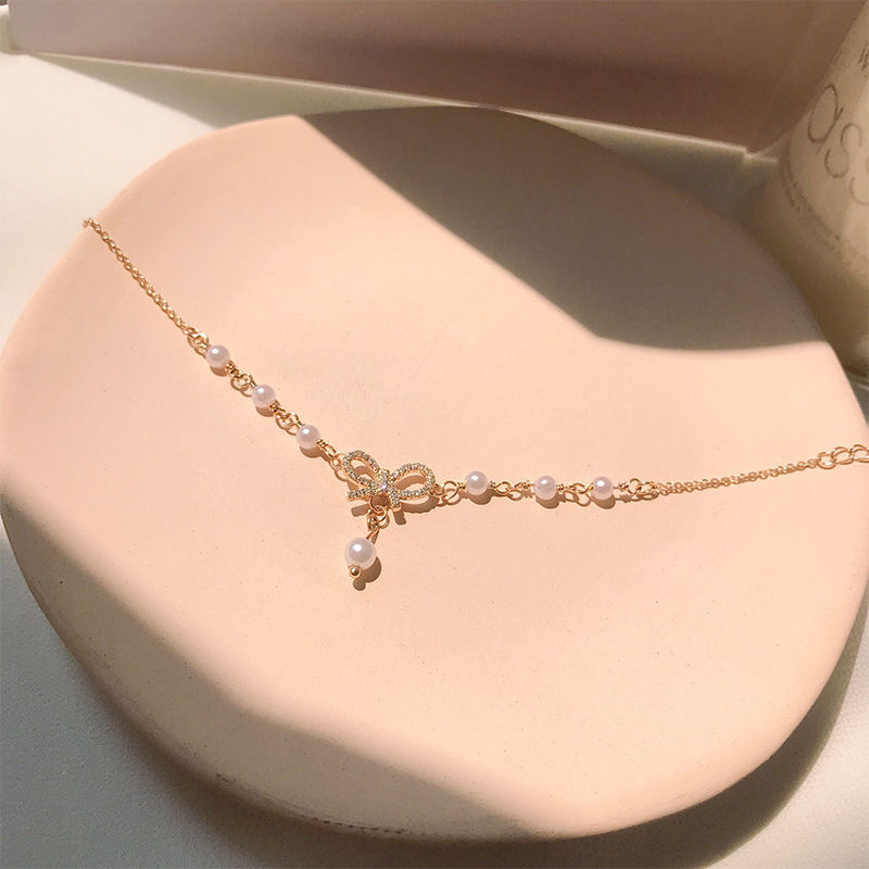 สร้อยข้อมือประดับมุก จี้รูปโบ สำหรับผู้หญิง - รูปที่ 2