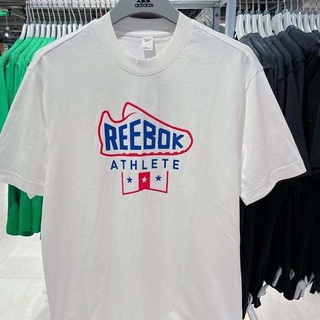 Reebok Ruipei เสื้อยืดคอกลม แขนสั้น ผ้าฝ้าย พิมพ์ลาย แฟชั่นฤดูใบไม้ผลิ และฤดูร้อน สําหรับผู้ชาย และผู้หญิง