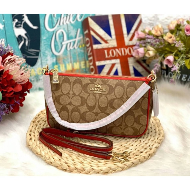 COACH HANDLE POUCH SIGNATURE BAG SN : F36674