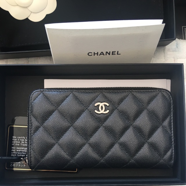 Used like new Chanel zippy wallet medium holo 24