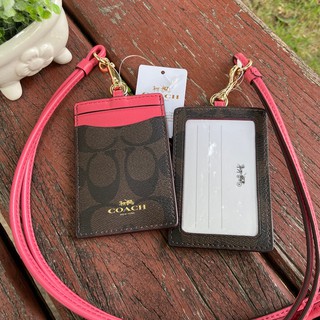 🎀 สายคล้องบัตร สีน้ำตาลเข้ม ลายซี สายสีชมพู F63274 IM/BROWN STRAWBERRY COACH SIGNATURE LANYARD ID CASE