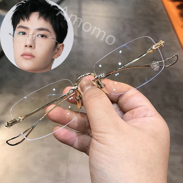 (แถมฟรีกล่องแว่นและผ้าเช็ดเลนส์) แว่นตา สายตาสั้น (-100~-500) ผู้ชายไร้กรอบเบาบาง แว่นตาป้องกันสีฟ้า
