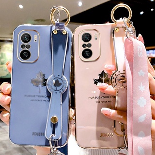 เคสโทรศัพท์มือถือ TPU แบบนิ่ม ลายใบเมเปิ้ล มีสายรัดข้อมือ สําหรับ Xiaomi POCO F3