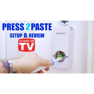 เครื่องกดยาสีฟันศูนย์ยากาศ พร้อมที่แขวนยาสีฟันToothpaste Dispenser วัศดุเป็นพลาสติกแข็ง ABS T0275