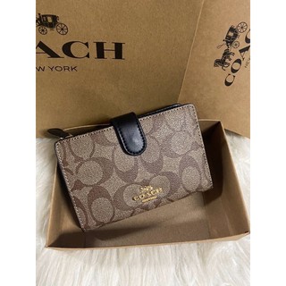 COACH Medium corner zip wallet