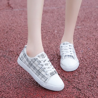 Xiaoxiang รองเท้าผ้าใบ ส้นแบน สีขาว สไตล์สปอร์ต สําหรับผู้หญิง นักเรียน