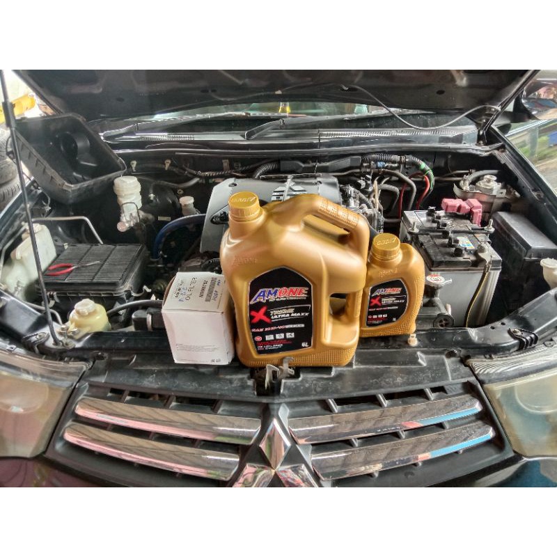 น้ำมันเครื่องดีเซลสังเคราะ AMONE พร้อมกรองน้ำมันเครื่อง SAE 10W-40 API CK-4 X TREME ULTRA MAXX