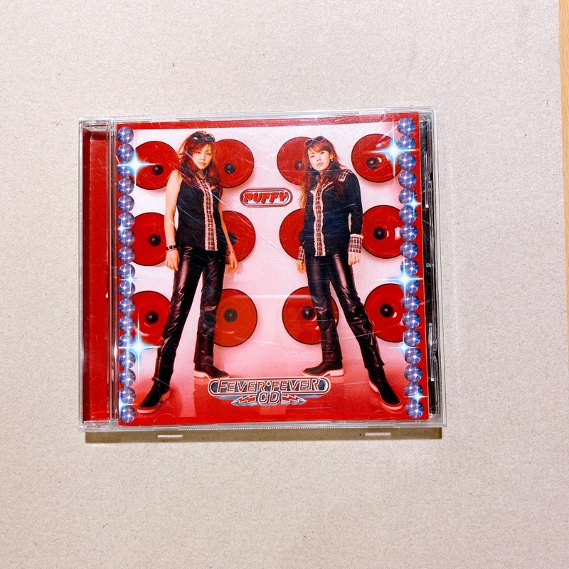 CD ซีดีเพลงญี่ปุ่น Puffy Fever Fever Album (Second Hand )