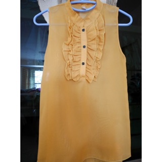 Yellow sleeveless top