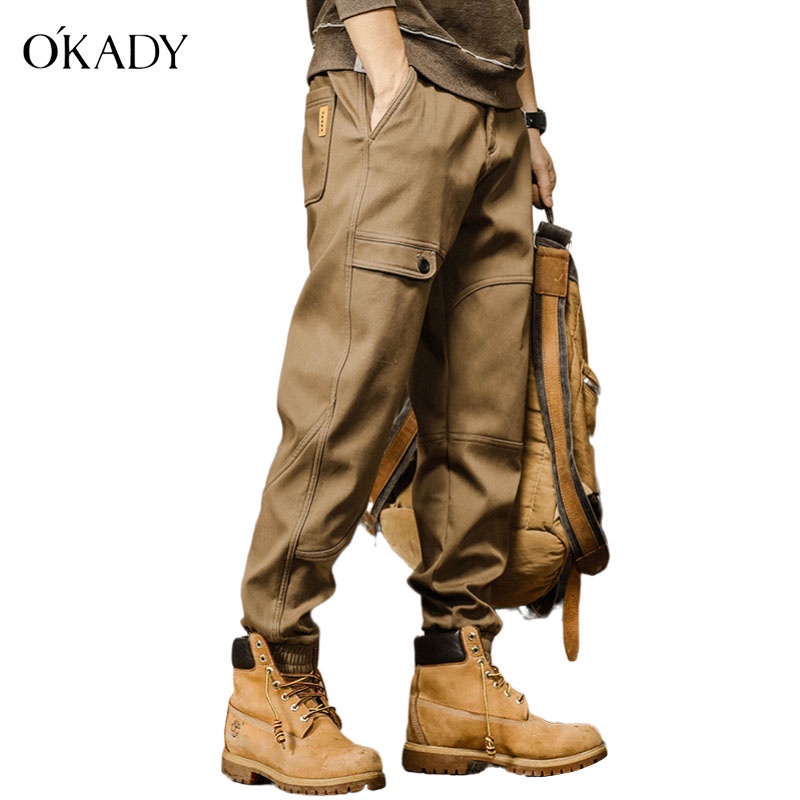 OKADY กางเกงทำงานหลายกระเป๋าผู้ชาย กางเกงฮาเร็มทรงตรงทรงหลวมในฤดูร้อน