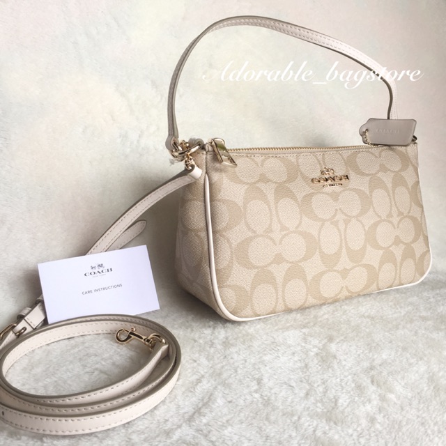 Coach Top Handle Pouch in signature