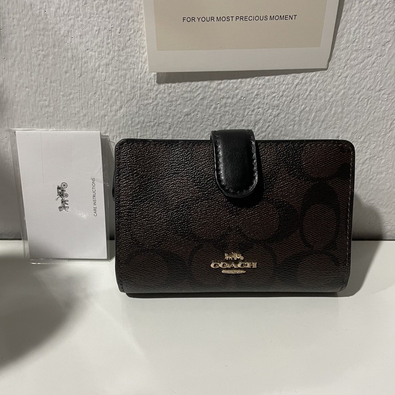 ส่งต่อ กระเป๋า สตางค์ coach สีน้ำตาลลายซี
