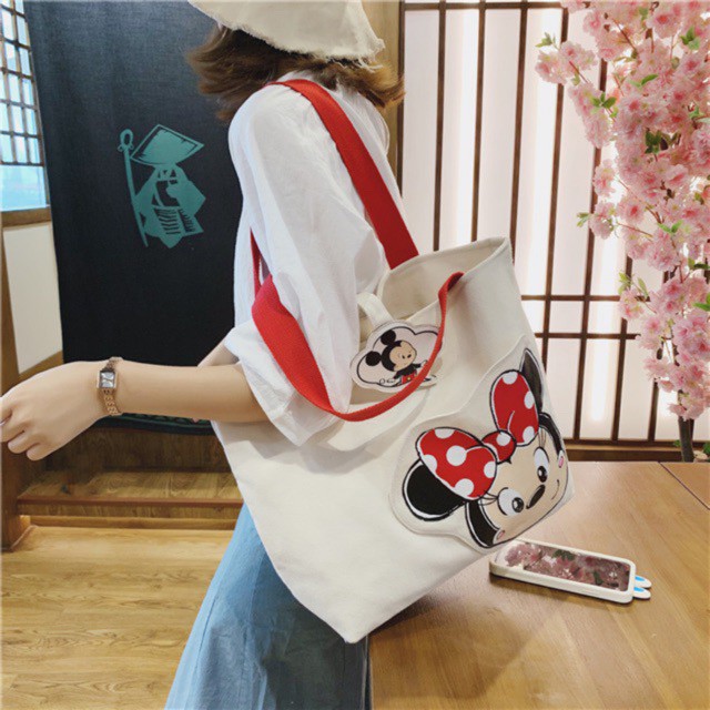 Disney กระเป๋าผ้าใบน่ารักมิกกี้เมาส์น่ารักกระเป๋าสะพายป่าใหม่การ์ตูนน่ารักเทรนด์ความจุสูง ✨✨ ราคา ถูกที่สุด ดีลบีเคเค รูปภาพหลัก