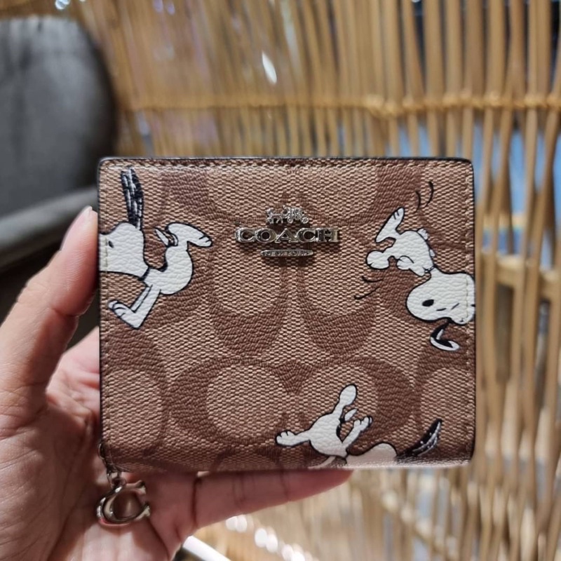 Coach X Peanuts Snap Wallet In Signature Canvas With Snoopy Print 