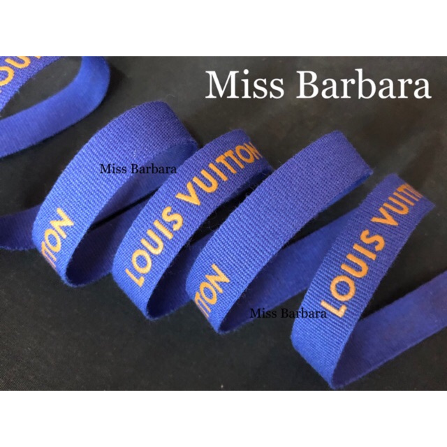 ริบบิ้น L V ของแท้ สีน้ำเงิน พิมพ์อักษรสีส้ม กว้าง 1.3 ซม. สำหรับผูกกล่องหรืองาน D.I.Y