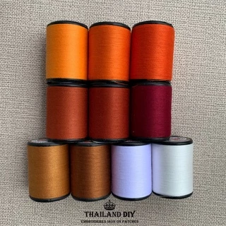 🧵 ด้ายเย็บจีวรพระ ตราเสือ 🧵 ด้ายสีจีวร ด้ายเย็บผ้า ด้าย WOP ด้ายเย็บผ้าคละสี สีทองส้ม ด้ายสีแก่นบวร สีพระราชทาน สังฆทาน