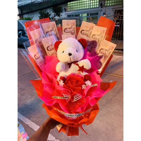 _ช่อหมีชมพูดอกไม้ใส่แบงค์ได้ 10 ใบใส่ได้แบงค์ 20 ถึงแบงค์พันค่ะ