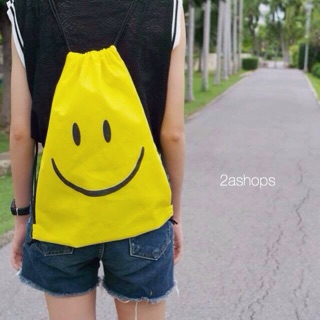 กระเป๋าเป็หูรูดลายSmile bag :) สีเหลือง