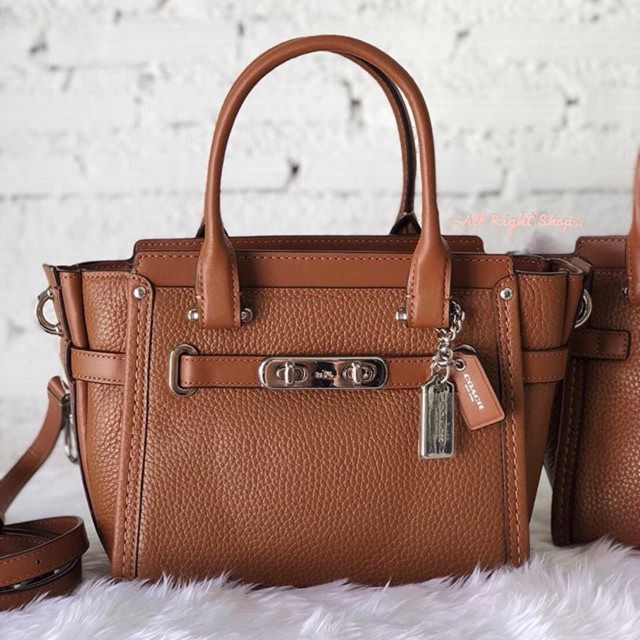 COACH swagger 21 carryall in pebble leather