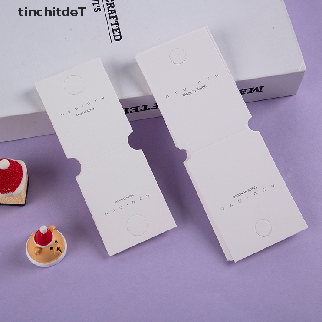 [TinchitdeT] [ขายดี] ป้ายแท็กกระดาษแข็ง แบบพับได้ สีขาว สําหรับแขวนแสดงเครื่องประดับ ต่างหู สร้อยข้อมือ ผม ยางรัดผม 50 ชิ้น