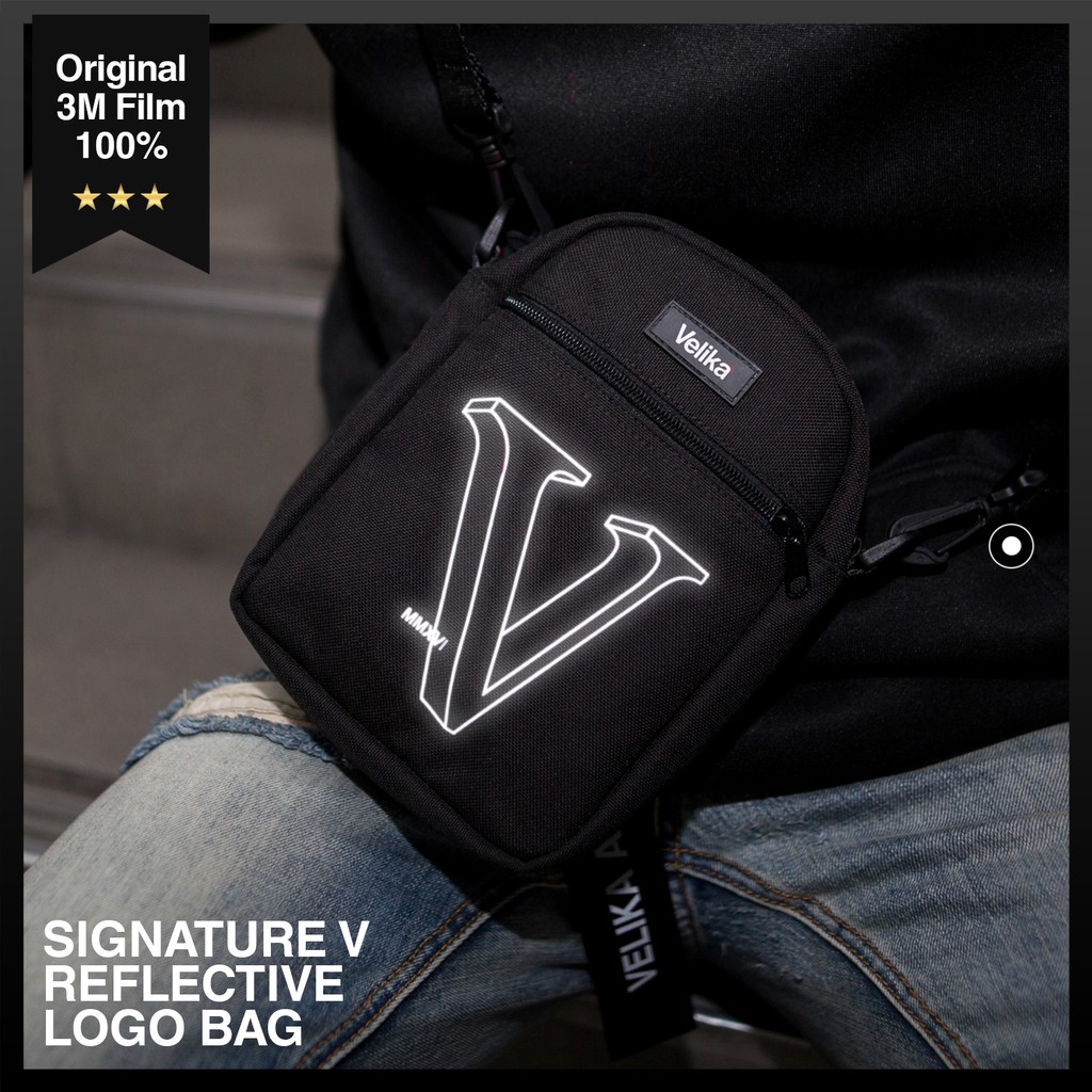 กระเป๋า Reflect โลโก้สะท้อนแสง - "Signature V" Reflective Bag | Velika