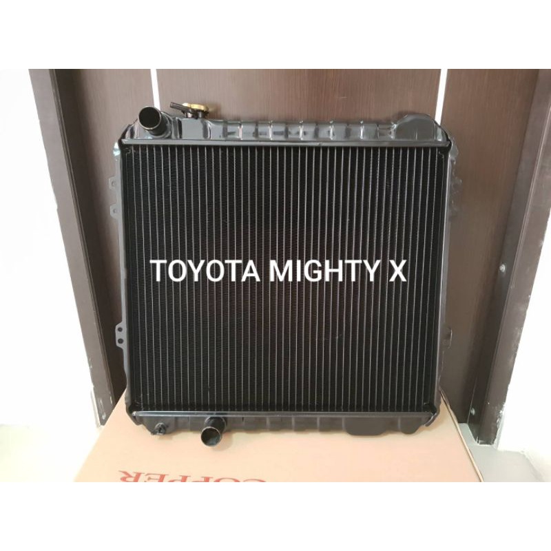 หม้อน้ำ ทองแดง - โตโยต้า Toyota Hilux Mighty-X  MT ปี91-98 ทองแดง 3 ชั้น (พวงมาลัยธรรมดา)