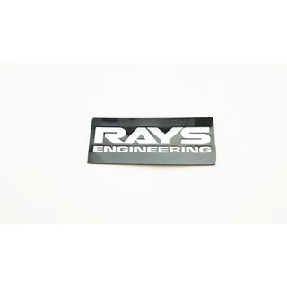 ป้ายโลโก้อลูมินั่ม RAY ENGINEERING สีดำขนาด 7.3x3.0cm ติดตั้งด้วยเทปกาวสงหน้าด้านหลัง