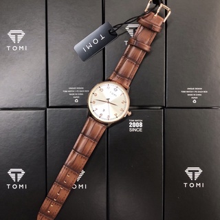 นาฬิกาข้อมือชาย TOMI ของแท้ Quartz analog สินค้าจัดส่งพร้อมกล่องตัวเรือนสไตล์แฟนตาซี มีวันที่ดูเวลาง่าย