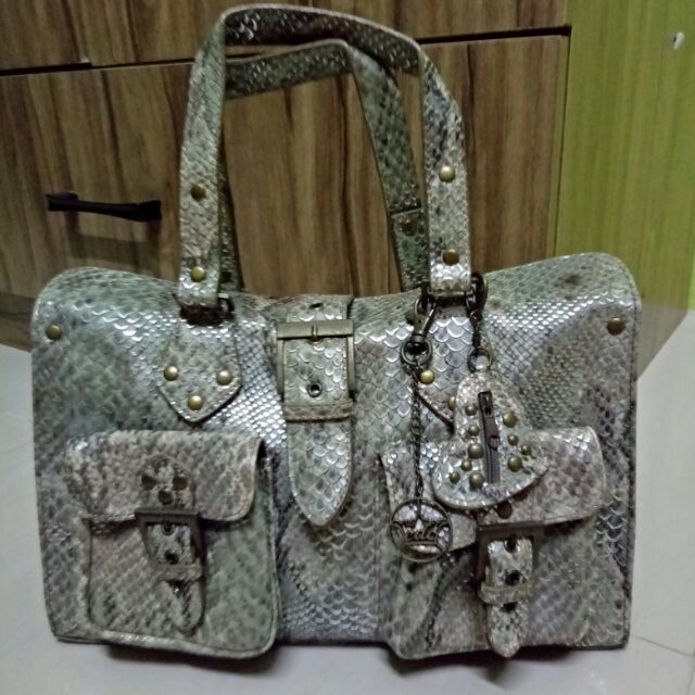 กระเป๋าลายหนังงู edc