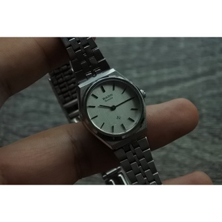 นาฬิกา Vintage มือสองญี่ปุ่น RADOSWISS MADEระบบQuartz ผู้หญิง ทรงกลม กรอบเงิน หน้าขาว หน้าปัด 26mm