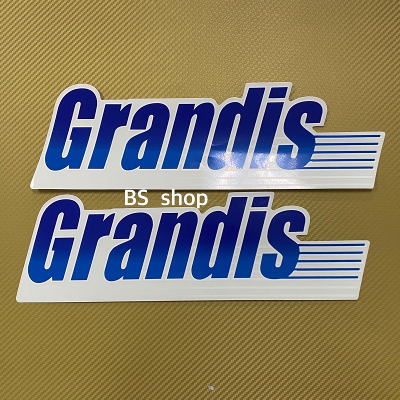 สติ๊กเกอร์* GRANDIS ติดข้างท้ายกระบะ มิซูบิชิ สตาด้า ราคาต่อคู่ มี 2 ชิ้น