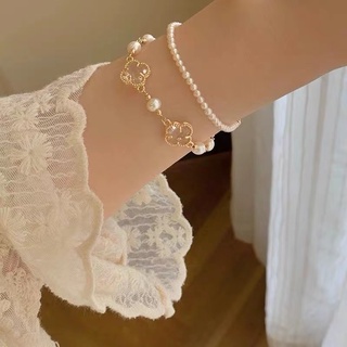 พร้อมส่ง สร้อยข้อมือ สองชั้น ประดับไข่มุก ใบโคลเวอร์สี่แฉก สไตล์เกาหลี ญี่ปุ่น ย้อนยุค หรูหรา เรียบง่าย เครื่องประดับ สําหรับนักเรียน แฟนสาว