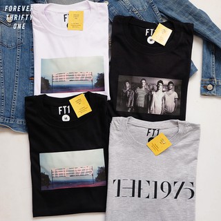 เสื้อเชิ้ตโลโก้ 1975 เสื้อยืด Unisex ผู้หญิงผู้ชาย }}f