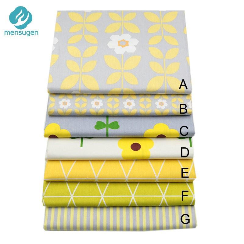 ผ้าฝ้าย 100% สีเทาสีเหลือง ลายสามเหลี่ยมพืช