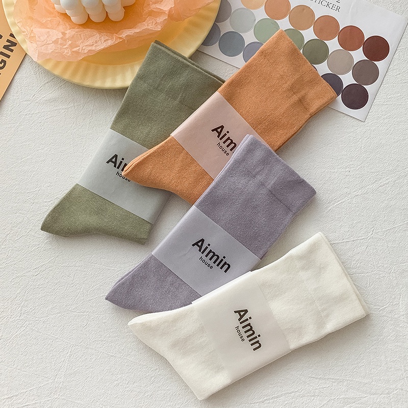 ถุงเท้า Datang D630 ถุงเท้ากองสีลูกกวาดสี Morandi เวอร์ชั่นเกาหลีญี่ปุ่นสีทึบถุงเท้าตัดกลางผ้าฝ้ายแท้อินเทรนด์
