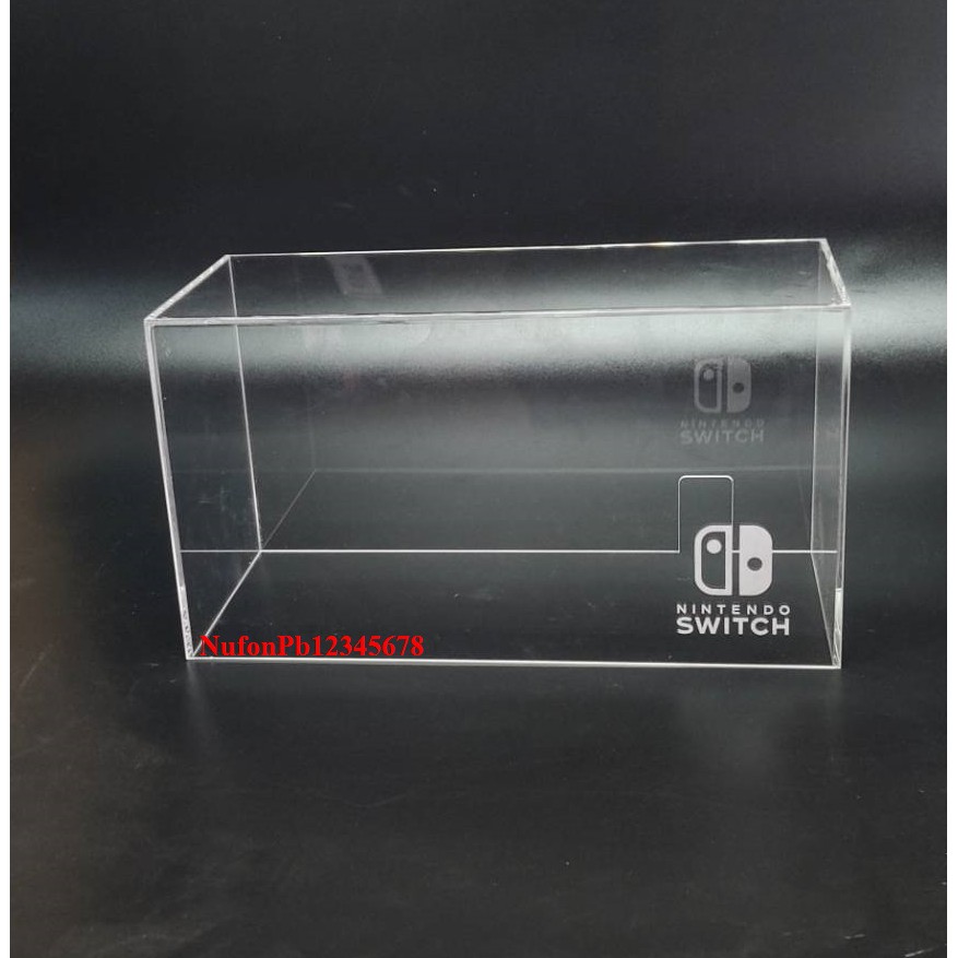 กล่องอะคริลิคใส ครอบเครื่อง NintendoSwitch เจาะรูด้านหลัง งานผลิตในไทย ไม่ใช่พลาสติกฉีด มียิงเลเซอร์โลโก้ด้านหน้า