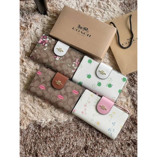 COACH TECH WALLET IN SIGNATURE CANVAS กระเป๋าสตางค์คล้องมือ