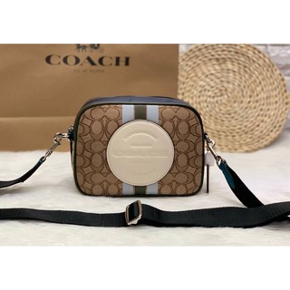 Coach Dempsey Camera Bag In Signature Jacquard With Stripe And Coach Patch (สีน้ำตาล)