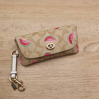 กล่องใส่แว่น Coach Sunglass Case In Signature Canvas With Watermelon Print ลายซีสีครีม ลายแตงโม