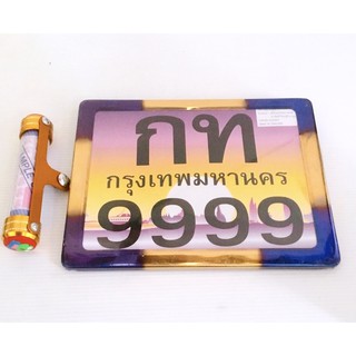 กรอบป้ายทะเบียนเลส-ไทเททอง พร้อมแคปซูลการ์ตูนสีส้ม