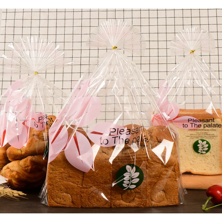 ถุงขนมปัง ถุงใส่ขนมปังปอนด์ ลายใบไม้ชมพูใสแพคละ 95-100 ใบ