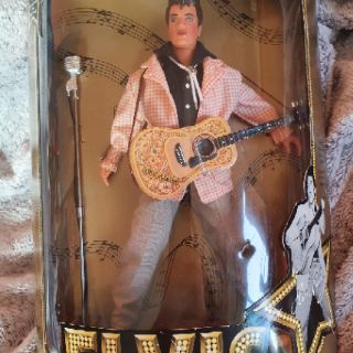 elvis the sun never sets on a legend doll